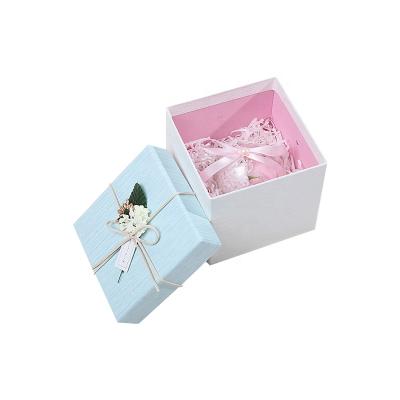 China Custom luxury cute pink top and bottom color texture paper material recycled baby shower candy box for kids gift for sale