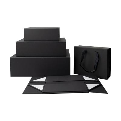 China Recycled Material Custom Printed Matte Black Logo Cardboard UV Foldable Paper Gift Box With Ribbon Closure Paper Box Packaging for sale