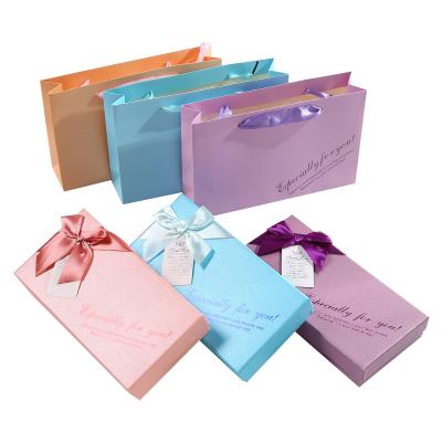 China Luxury Customized Recycled Material Baby Gift Sets Newborn Box Folded Ribbon Gift Boxes for sale