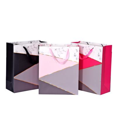 China Recycled Material Wholesale Custom Printed Various Size Luxury Gift Paper Shopping Bag Colorful With Logo for sale