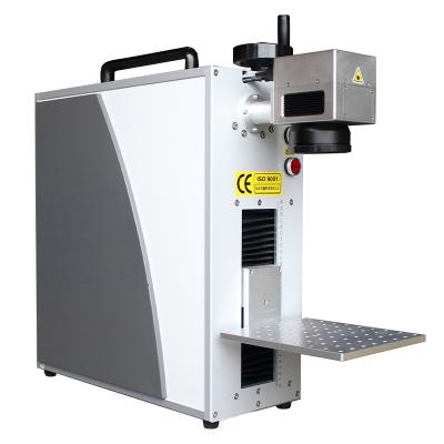 China Circuit Blocks 20W Fiber Laser Code Inkjet Printer Marking Machine For Hardware Tools for sale