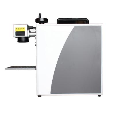 China Circuit Blocks 20W Fiber Laser Code Inkjet Printer Marking Machine For Hardware Tools Factory for sale