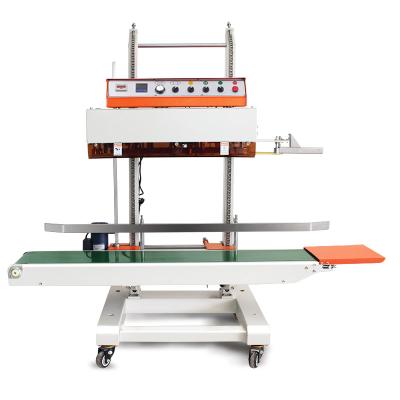 China Automatic Vertical Food Sealing Machine With Conveyor For Heavy Product for sale