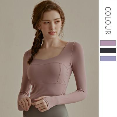 China QUICK DRY European and American advanced feeling yoga clothes with long sleeved chest pad women's sports for sale