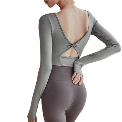 China 2022 Breathable Long Sleeve Suit Tights Running Professional Pilates Training Gym Sport Top Women Yoga Suit With Chest Pad for sale