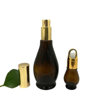 China Dark brown simple gourd shaped glass bottle of personal care dropper design essential oil esay to carry for sale