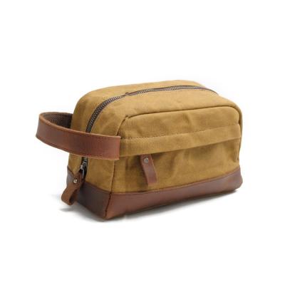 China Foldable Travel Waxed Waterproof Leather Canvas Toiletry Pouch Bag For Men for sale