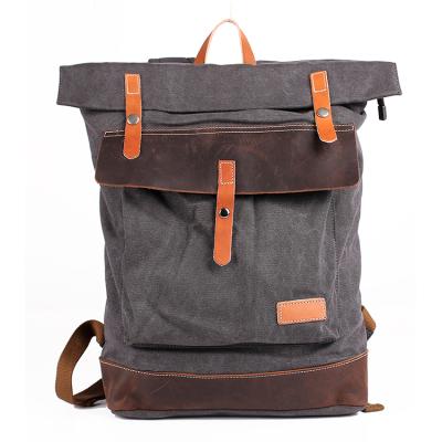 China Waterproof Vintage 100% Cotton Canvas School Backpack Bag With Cowhide Leather Trims for sale