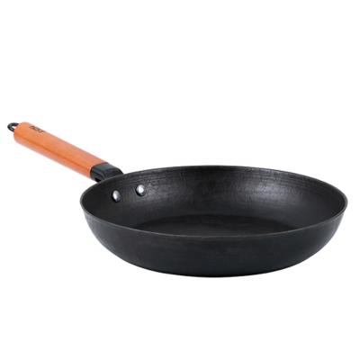 China 28 Cm Stocked Healthy Cooking Cast Iron Frying Pan Skillet With Wooden Handle for sale