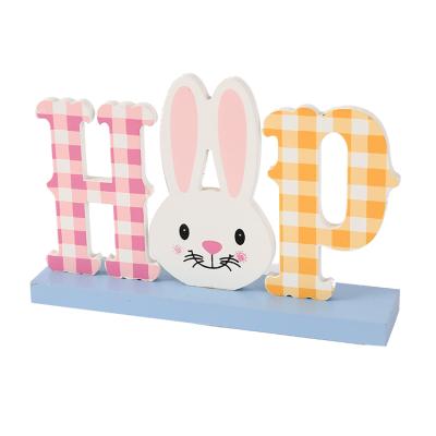 China Table Decoration Holding Happy MDF Sign Easter Bunny Rabbit Decoration Spring Ornaments Easter For Garden Decoration for sale