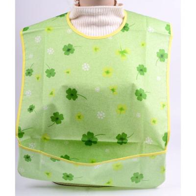 China Sustainable Reusable Waterproof Plastic PVC Baby Bib With Food Pouch For Adult for sale