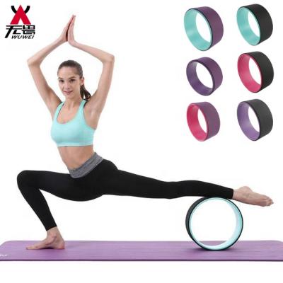 China Durable High Quality Eco-friendly Professional Pilates Tape ABS Training Tool Yoga Wheel Back Roller for sale