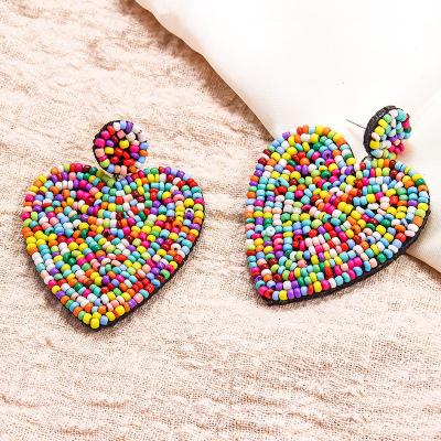 China Hot CLASSIC European creative ethnic bohemian love color wind style cloth rice beads handmade earrings for sale