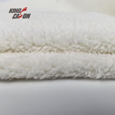 China Kingcason Breathable Hot Selling Solid 100% Polyester Home Textile Sherpa Fabric For Blanket Clothes for sale