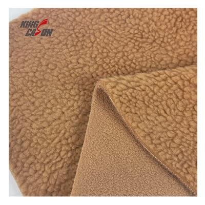 China Kingcason China Manufacturer Knitted Anti-Pilling Comfortable 100%POLY Anti-Static Double Sided Bonded Coral Sherpa Fabric For Coat for sale