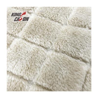 China Anti Static Kingcason Made In China Beige Jacquard Flannel Fleece Fabric For Home Textile for sale