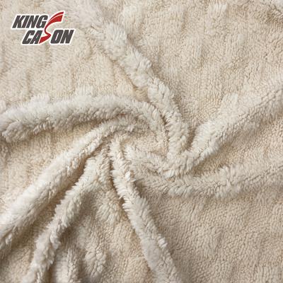 China Antistatic Kingcason Wholesales Antipilling Jacquard Sherpa Velvet Fabric For Clothes for sale