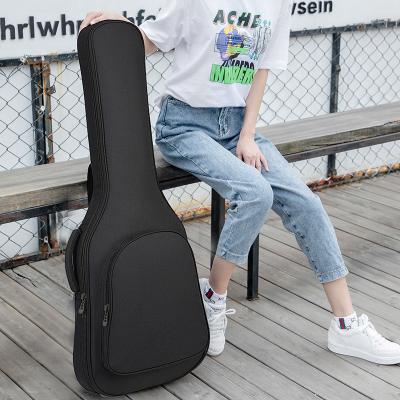 China FYCW Custom Guitar Shaped Handbag Travel Guitar Bag Hard Case Guitar Gig Bag for sale