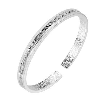 China CLASSIC 9999 Solid Bangle Fashion Relief Adjustable Sterling Silver Bracelet Female Advanced Design Grain Bangle for sale