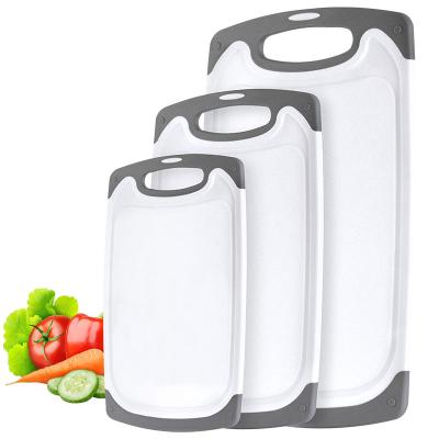 China Yangjiang Factory Chinese 3pcs Sustainable Plastic Kitchen Cutting Board Set Of 3 With Juice Grooves Easy Grip Handles BPA Free Food Grade for sale