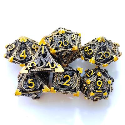 China New Dragon and Dungeon Chain Metal Cut Hollow Metal Dragon Dice Round Font Dice for sale