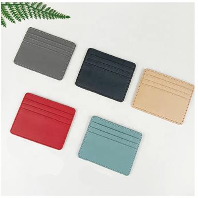 China Minimalist Vintage Front Pocket Wallet Thin Slim RFID Blocking Custom Leather Credit Card Holder for sale