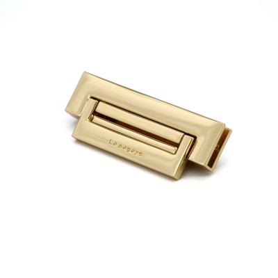 China Custom high quality cheap durable gold release metal buckle metal light locks for handbags for sale