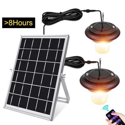 China Amazon New Shell Warm Light Garden Remote Control Residential Hot Selling Solar Waterproof Pendant Light High Quality Black for sale