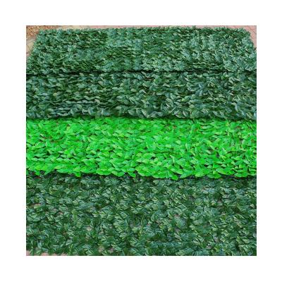 China Waterproof Custom Plastic Green Leaf Hedge Plant Artificial Green Hedges Edging Fence HYLB01 For Garden Wall Decor for sale