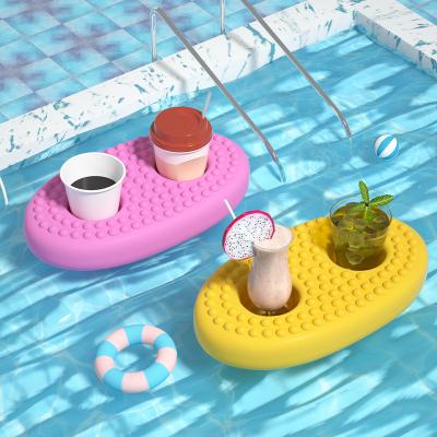 China Newest Design 2022 Sustainable Design Coffee Cup Coaster Water Bottle Holder Food Grade Silicone Floating Tumbler Holder for sale