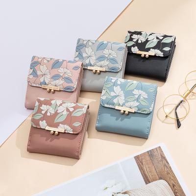 China The other 2021 top selling NEW style simple flower pearl three fold shorts small leather wallet woman for sale