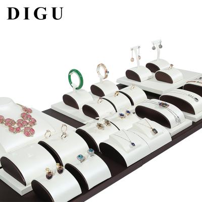 China Wholesale Custom White Storage DIGU Windows PU Windows Jewelry Display Set Earring Bracelet Exhibitor Organizer Rack for sale