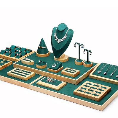 China Morden DIGU Luxury Green Color Wooden Jewelry Display Stand For Earring Bracelet Wood Jewelry Packaging Display Set for sale