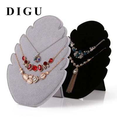 China Custom Jewelry Display DIGU Logo Jewelry Display Rack For Fashionable Black Necklace Pilou Luxury Jewelry Necklace Display Stand for sale