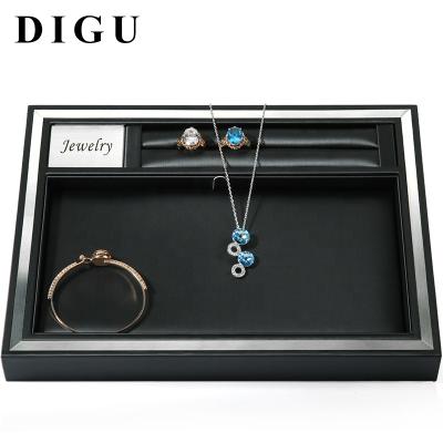 China Jewelry Display DIGU Jewelry Display Tray Jewelry Display Stand Black Brushed Leather Props Rings Jewelry Pallet Display Bracelet Necklace Tray for sale