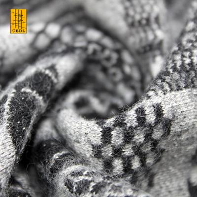 China Very Nice breathable high quality black and white wool fabric knit jacquard for apparel design or pants or garments en venta