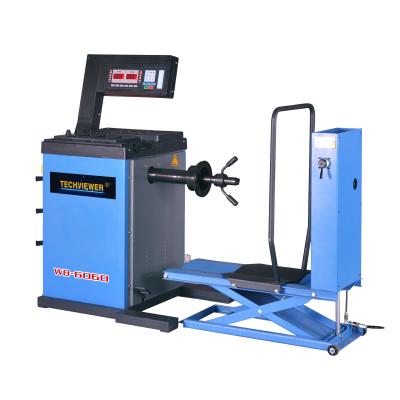 China 110v 220v 380v Truck Wheel Balancing Machine 1.45CBM With Tire Lift For Bus for sale