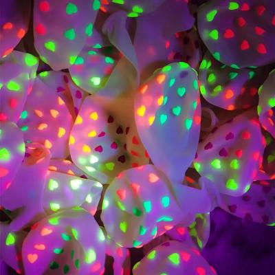 China Promotion latex balloon party toys 12inch fluorescent balloon containing 12inch glitter fluorescent latex balloons that glow in the dark for sale