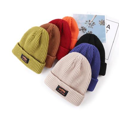 China COMMON Cheap Custom Logo Winter Hat Fisherman Knitting Beanie for sale