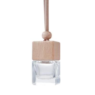 China Hand Blown Glass Decoration Cap Cubic Wooden Beeds Perfume Empty Essential Oil Glass Bottle Hanging Decor for sale