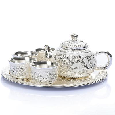 China Sustainable antique silver teapot set with saucer for sale