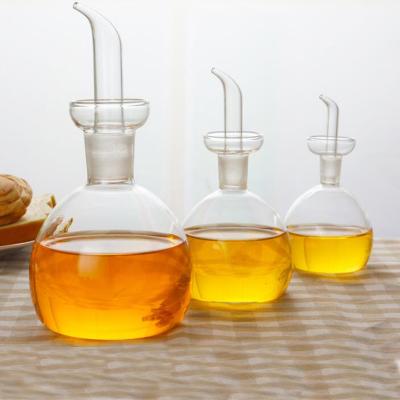 China Viable Round 150ml Condiment Serve Olive Oil Vinegar Dispenser Glass Bottle for sale