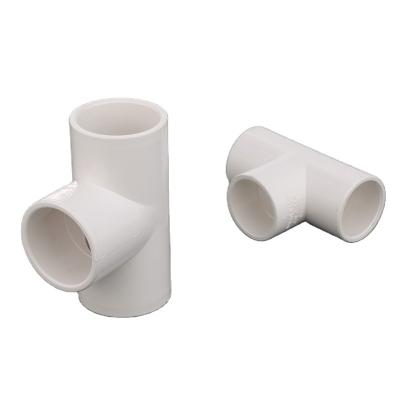 China Water Supply Custom PVC Pipe Fittings Two Way Plastic Mount Design for sale