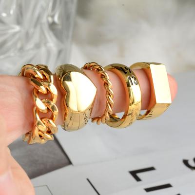 China Simple Punk Vintage 18K Gold Vacuum Plated Stainless Steel Ring Heart Chunky Women Finger Ring for sale