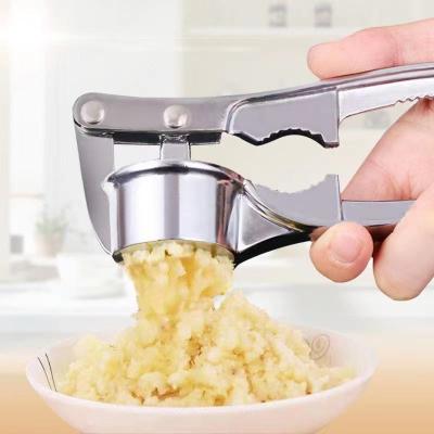 China Viable Household Cheap Zinc Alloy Kitchen Tools Stainless Steel Price Manual Garlic Press Crusher for sale