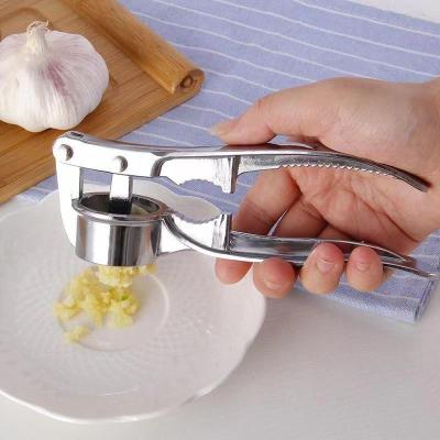 China Sustainable Universal Home Use Manual Food Presser Stainless Steel Hand Garlic Cutter for sale