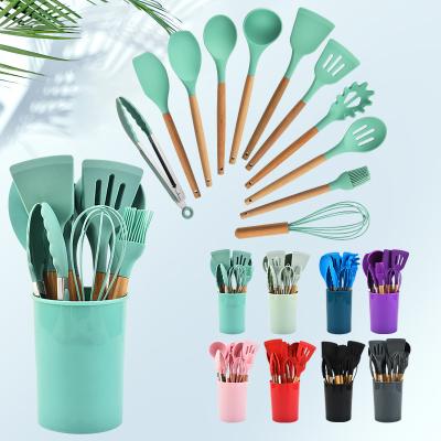 China Sustainable Heat Resistance 12 Pieces Nonstick Wooden Handle and Silicone Kitchen Cooking Tools Kitchen Utensils Set with Rack for Wholesale for sale