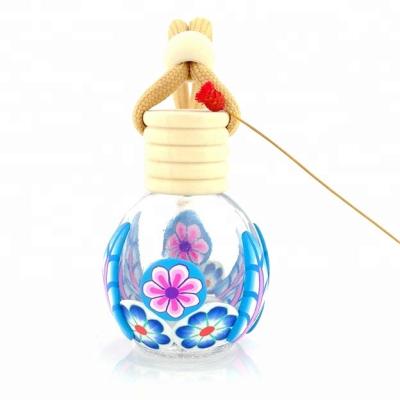 China Personal Care Use Industrial Car Perfume Sample Bottle Refillable Glass Material Hanging Perfume Bottle For Environmental Product for sale