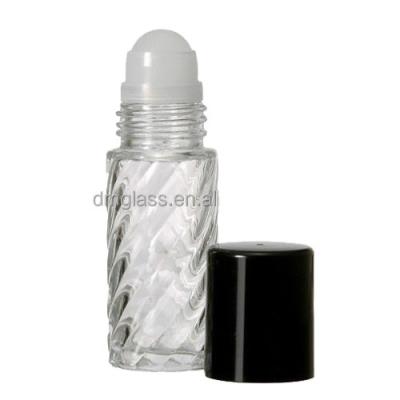 China Personal Care 30ml Clear Roll On Glass Bottle With Plastic Roller Ball for sale