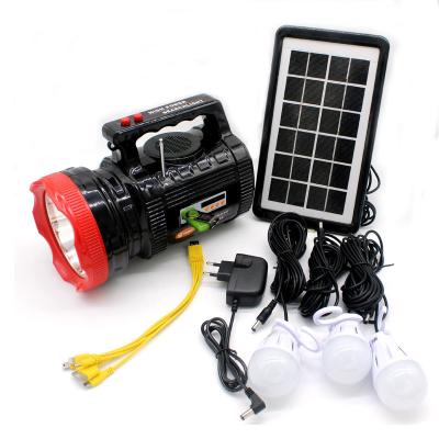 China Emergency Long Range Lighting System Portable Outdoor Solar Rechargeable Flashlight With Radio And Power Bank for sale